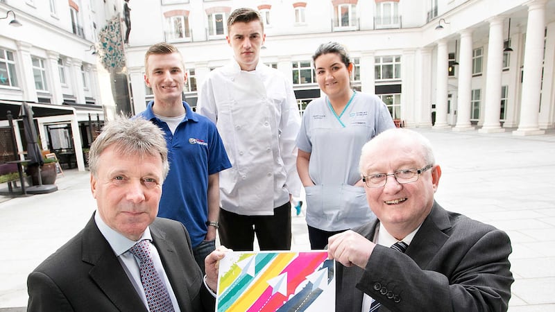 Managing director at Business in the Community Kieran Harding and director at Include Youth Paddy Mooney with (back, from left former care leavers Michael Doggart, Connor Arthurs and Tanya McCallen. Picture by&nbsp;Include Youth/Press Association&nbsp;