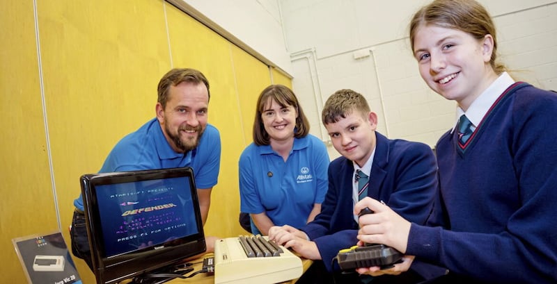 Director at Allstate NI Rob Smyth, ICT teacher at Wellington College Belfast Gemma Ross and Year 10 Pupils Ryan Adams and Amy Harrower 