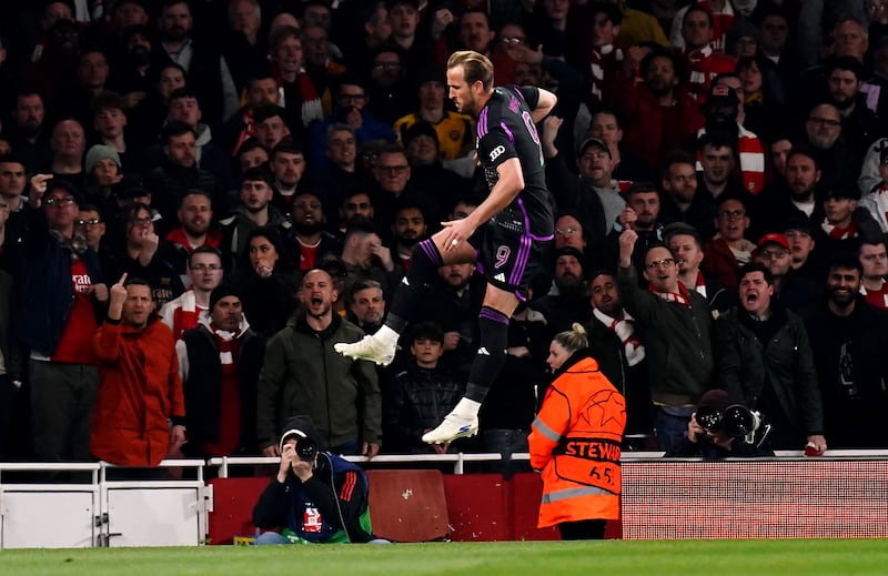 Harry Kane celebrates scoring a penalty during the first leg