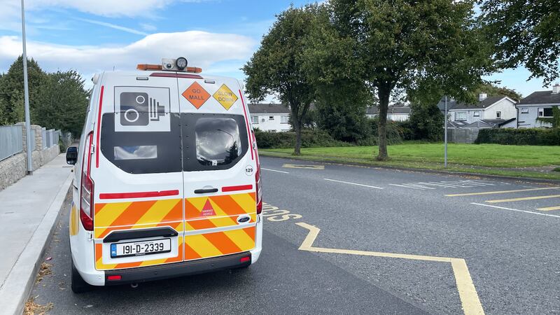A Garda checkpoint takes place outside Gaelscoil Chnoc Liamhna in Knocklyon, Dublin (Grainne Ni Aodha/PA)