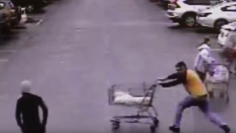 Officers in Georgia chased the suspect into a car park of a Home Depot store where a bystander shoved the cart into him.