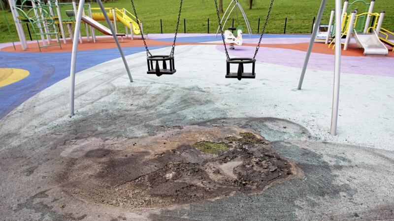 Damage to the surface of the play area at Glencairn in north Belfast. Picture by Ann McManus. 