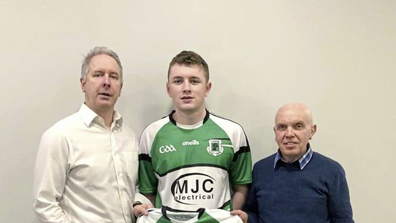 The Rock St Patrick&#39;s minor team were recently presented with a new strip for the coming season, sponsored by local electrical contractor MJC Electrical. Pictured is Michael Carroll of MJC Electrical presenting the new jerseys to minor team captain Shea Daly and minor co-manager Adrian Nugent 
