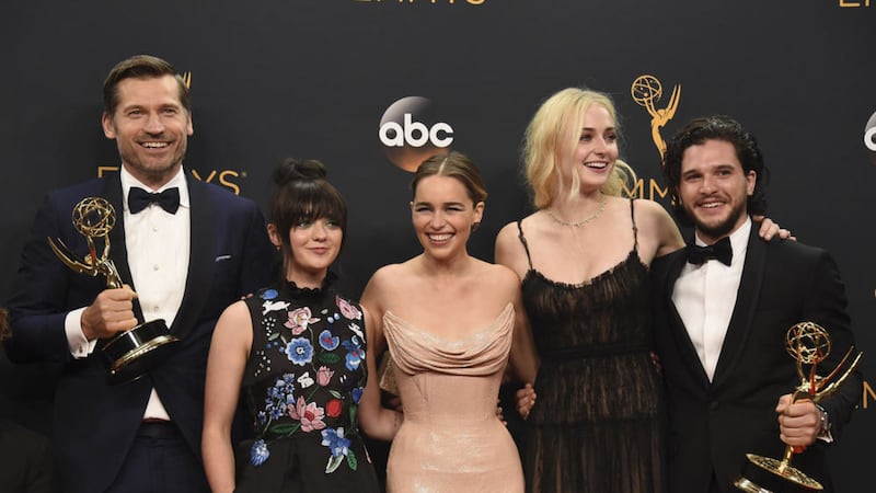 From left, Nikolaj Coster-Waldau, Maisie Williams, Emilia Clarke, Sophie Turner, and Kit Harington winners of the award for outstanding drama series for Game of Thrones, pose in the press room at the 68th Primetime Emmy Awards on Sunday. Picture by Jordan Strauss, Invision, Associated Press 