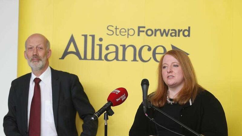 Naomi Long said she will be seeking legal advice following revelations she was implicated in a property scandal by Sinn F&eacute;in during a back channel exchange with loyalist Jamie Bryson. 