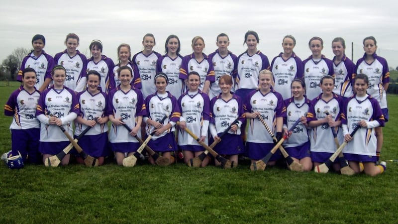 St MacNissi&#39;s before the 2007 All-Ireland semi-final in Middleton in Cork. Bernie Convery fourth from the right, back row. Antrim All-Ireland intermediate medallists Maeve Connolly (third from right) and Colleen Patterson (extreme right) are in the front row. 