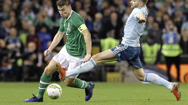 Republic of Ireland captain Seamus Coleman (left) takes on Northern Ireland's Stuart Dallas in the Dublin friendly last year. The teams could meet in a play-off for a Euro 2020 place next March.