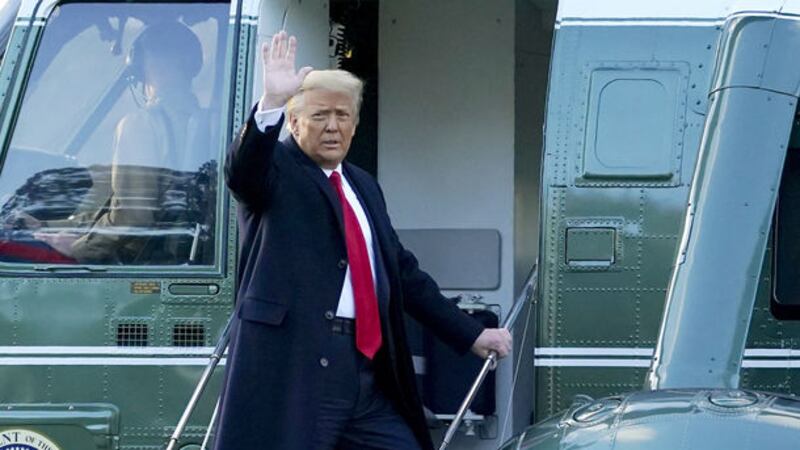 President Donald <span class="red">Trump</span> waves as he boards Marine One on the South Lawn of the White House, Wednesday, January 20, 2021, in Washington. Picture by AP /Alex Brandon