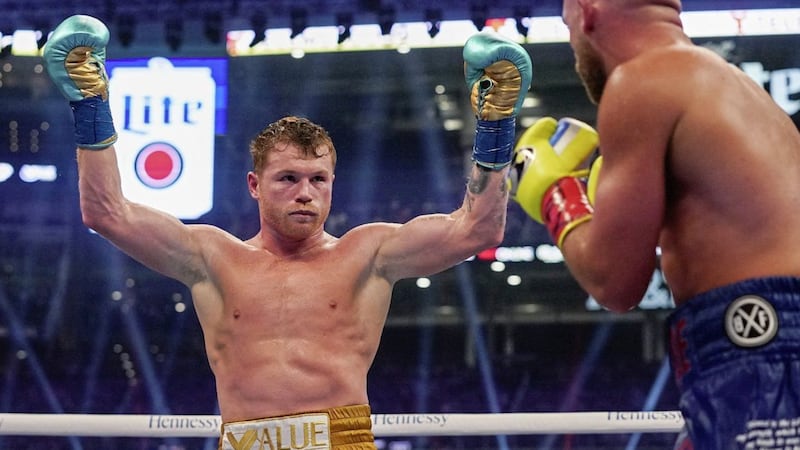 Saul &#39;Canelo&#39; Alvarez raises his hands as he closes in on victory over Billy Joe Saunders at a packed AT&amp;T Stadium in Texas last weekend. Picture by AP 