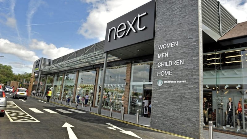 Retailer Next has warned that trading remains &quot;extremely volatile&quot; 
