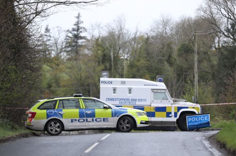 &nbsp;PSNI vehicles block a road during a security operation which has been ongoing since Monday on the Ballyquin Road after a viable explosive device was found close to the home, in a rural area close to Dungiven, of a member of the Police Service of Northern Ireland in Co Derry. Picture date: Tuesday April 20, 2021.