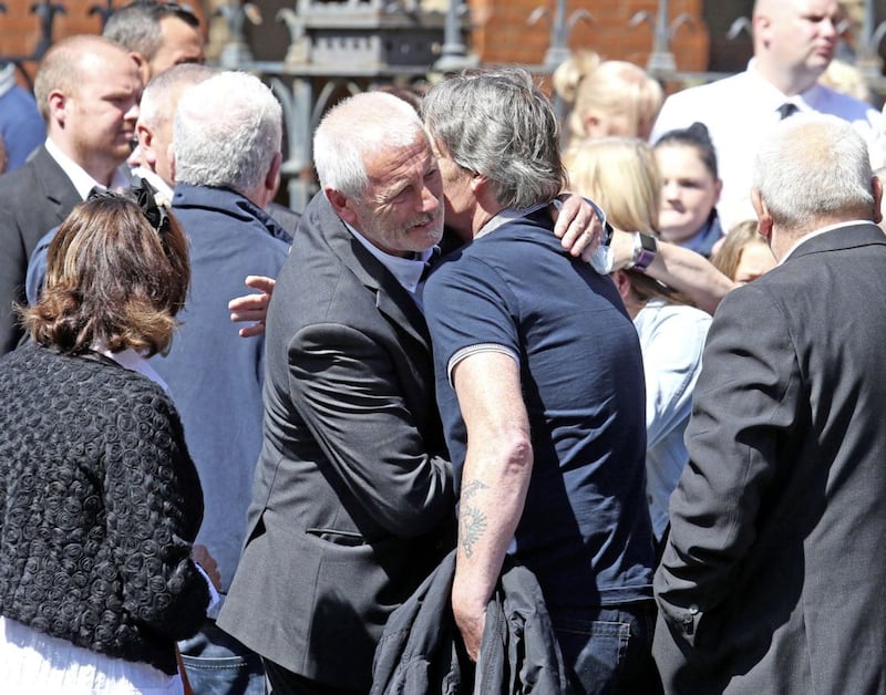Mourners at the funeral of Billy McConville at St Pauls Church on the Falls Road. Picture by Mal McCann 