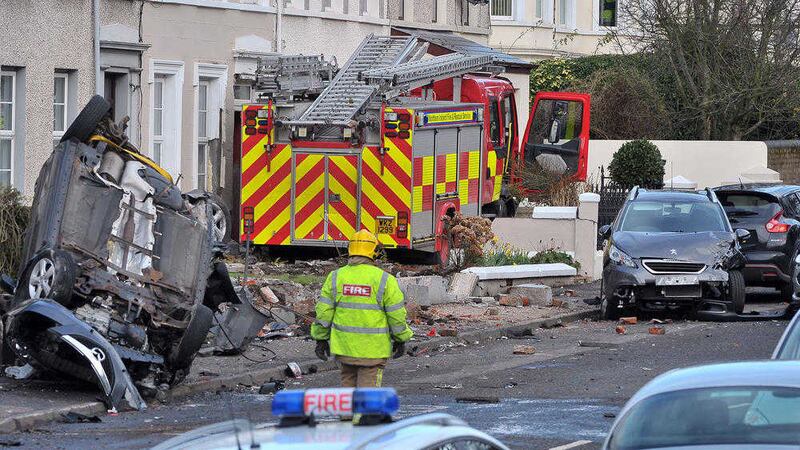 The appliance smashed into several cars and houses during the incident 