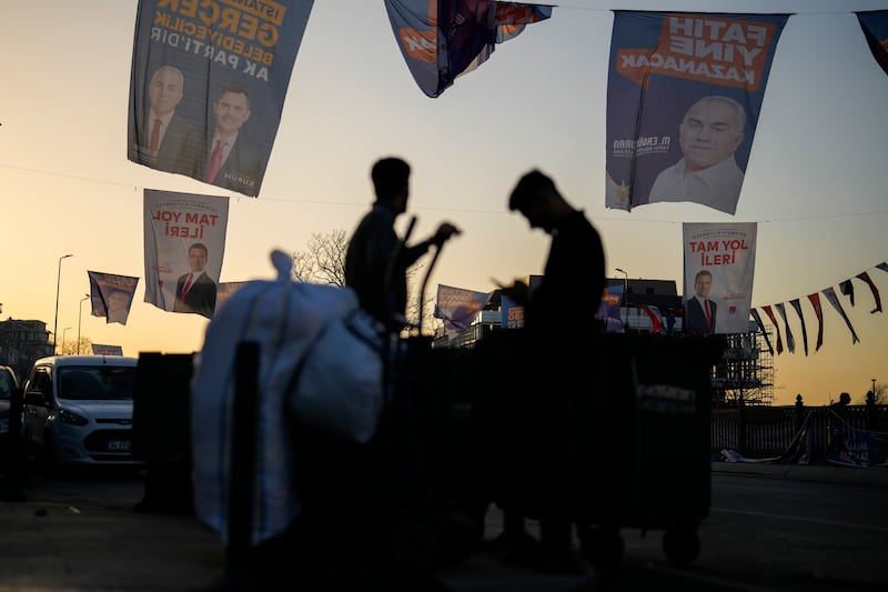 Campaign banners of candidates on display in Istanbul (Francisco Seco/AP)