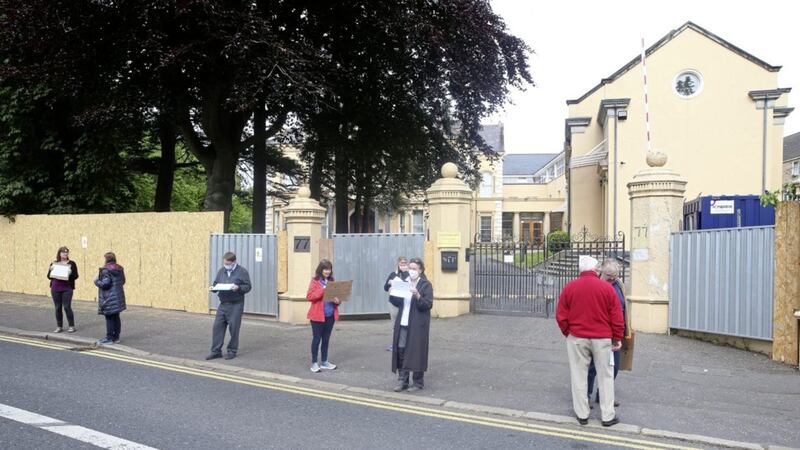 Residents protest outside the Chinese Consulate on south Belfast&#39;s Malone Road over building work continuing on a wall without planning permission. Picture by Mal McCann 