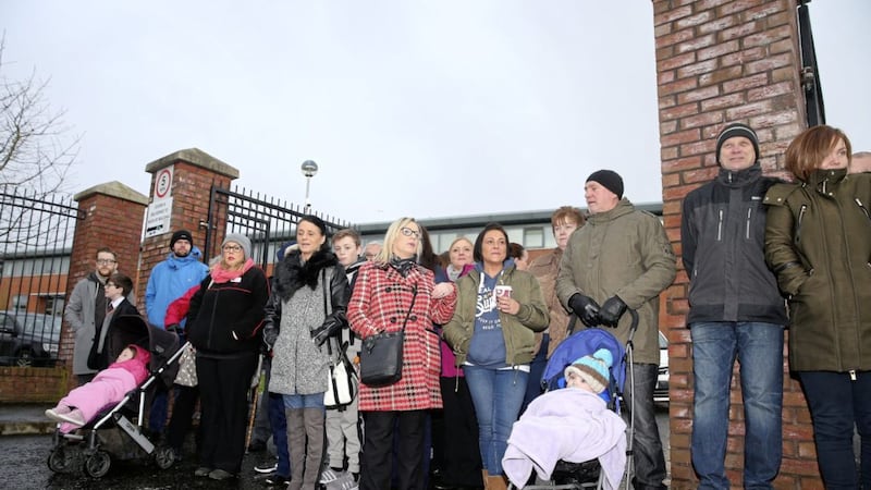 Concerned parents of De La Salle hold a protest outside the school. Picture by Mal McCann 