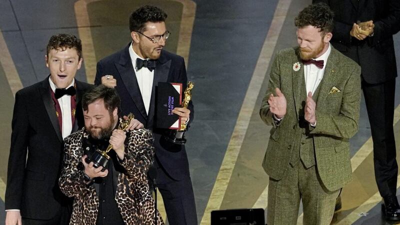 Ross White, from left, James Martin, Tom Berkeley and Seamus O&#39;Hara accept the award for best live action short film for &#39;An Irish Goodbye&#39; at the Oscars. Picture by AP Photo/Chris Pizzello 