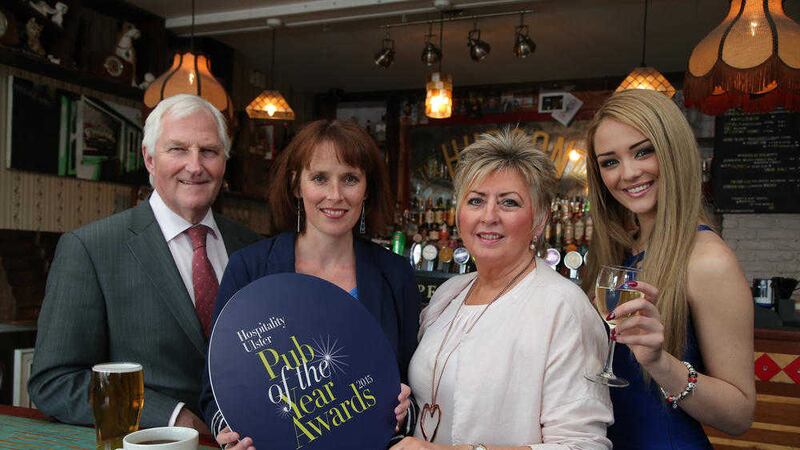 Greer Publications owners James and Gladys Greer with Hospitality Review editor Alyson Magee at the launch of last year&#39;s Pubs of Ulster Awards 