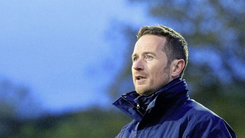 Newry City manager Darren Mullen heaped praise on his players and coaching staff after they clinched promotion to the senior ranks at the expense of Carrick Rangers on Wednesday night 