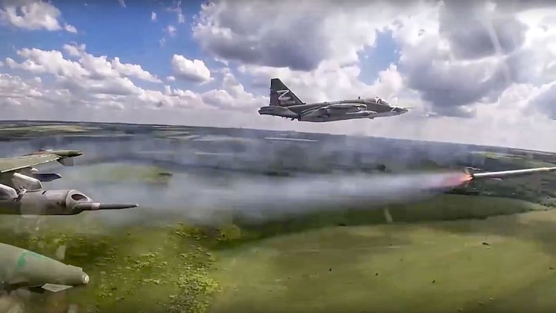 A Russian Su-25 ground attack jet fires rockets on a mission at an undisclosed location in Ukraine (Russian Defense Ministry Press Service via AP)&nbsp;