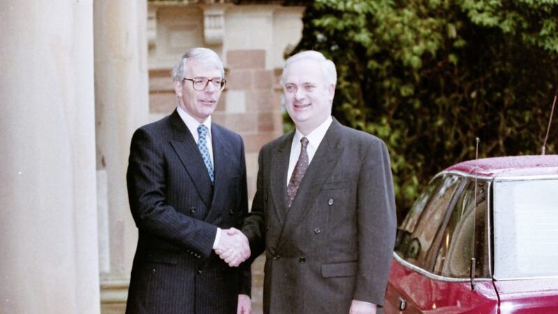 Taoiseach John Bruton and British PM John Major pictured at Hillsborough Castle in 1995 for the launch of their framework document on peace negotiations 