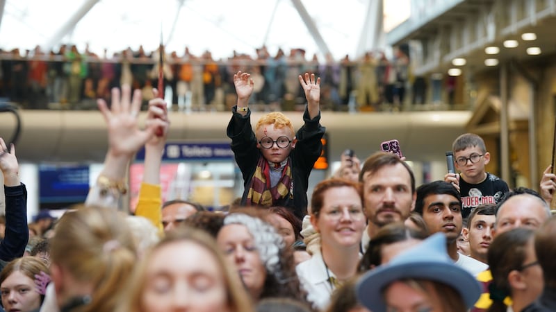 Harry Potter fans of all ages gathered at Kings Cross station in London on Friday to celebrate the annual Back to Hogwarts Day (Lucy North/PA)