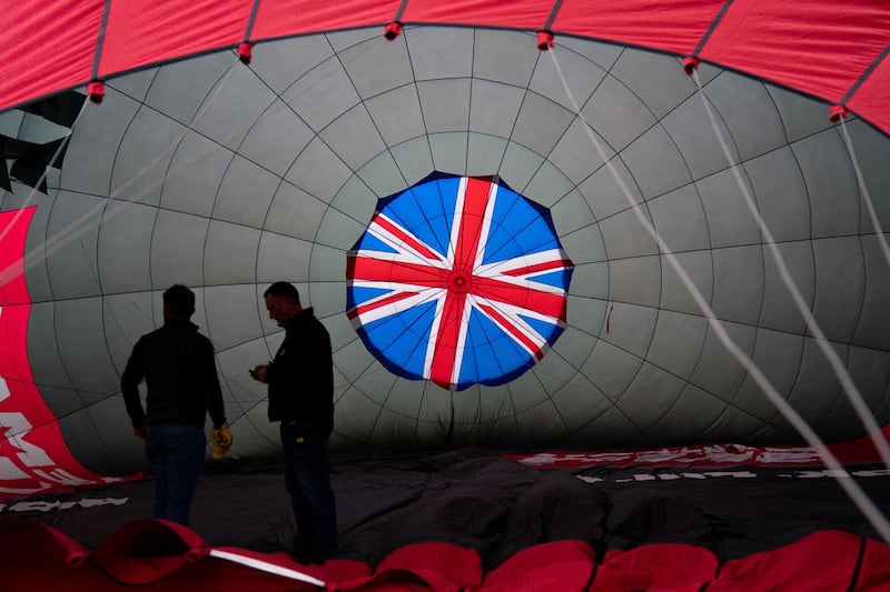A balloon is inflated prior to its flight (Jacob King/PA)