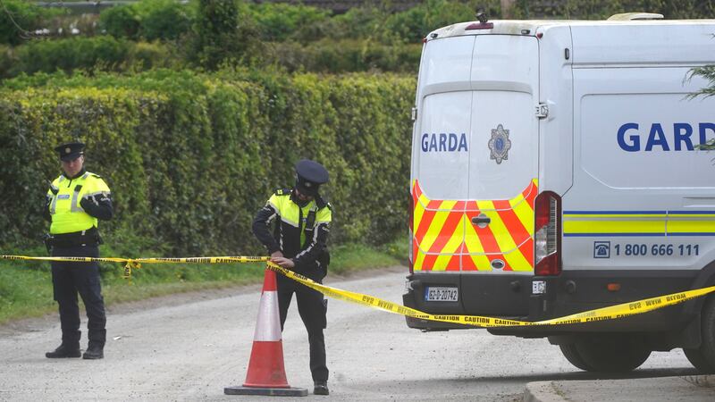 Garda at a closed road in Newtownmountkennedy after protests near Trudder House