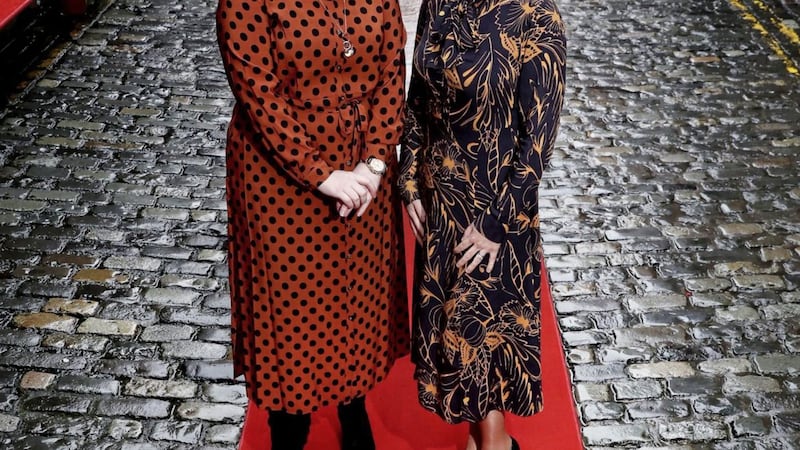 IoD NI national director Kirsty McManus (left) joins Lisa McLaughlin of Herbert Smith Freehills to roll out the red carpet ahead of the 2020 IoD Women&rsquo;s Leadership Conference at the Crowne Plaza on March 6 
