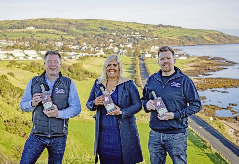 Founders of Glens of Antrim Distillery, Michael, Mary and Charlie McKillop with Lir Green Crest in Cushendall. 