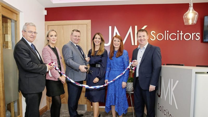 Pictured at the opening of the JMK Solicitors office in Newry are (from left) Colm Shannon, chief executive of Newry Chamber of Commerce; JMK&#39;s Olivia Meehan (legal services director), Jonathan McKeown (chairman) and Maurece Hutchinson (managing director), and Sinead McAllister and Tony McKeown from CRASH Services 