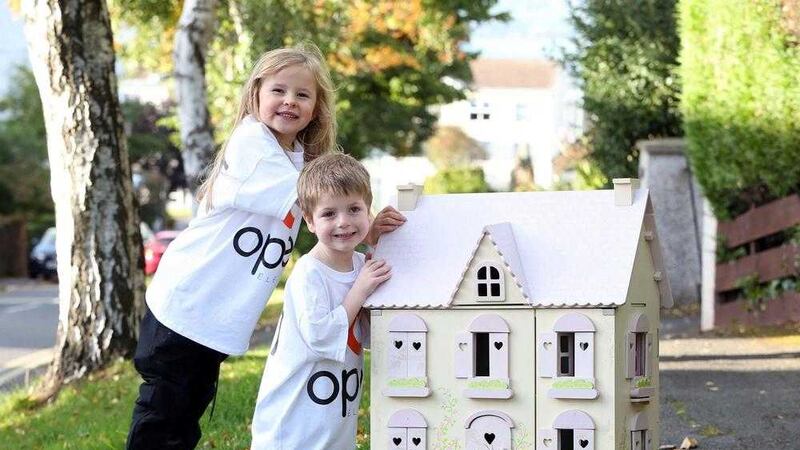 Open Electric is cutting its power price by 8.6 per cent. Pictured are Kitty Heavern and Aidan McLean who helped launch the company last year 