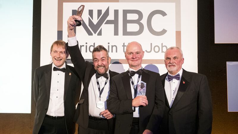 Pride in the job: Mike Quinton, NHBC chief executive and NHBC director David Little with Alan Lynas of Porter &amp; Co and Stephen Austin of Dunlop Homes Ltd