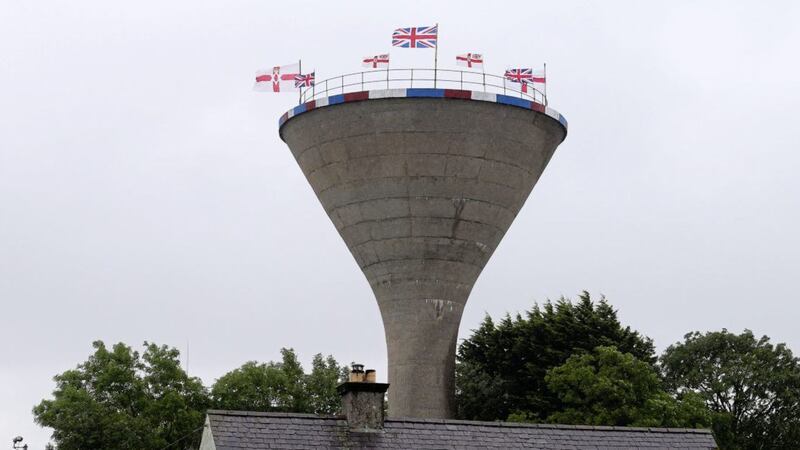 Union and Northern Ireland flags placed on a water tower in Rathfriland, Co Down. Picture by Mal McCann 
