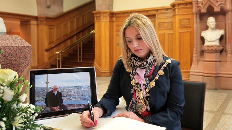 Elisha McCallion, the then mayor of Derry signs a book of condolence in the Guildhall after the death of Paddy 'Bogside' Doherty. Picture by Margaret McLaughlin
