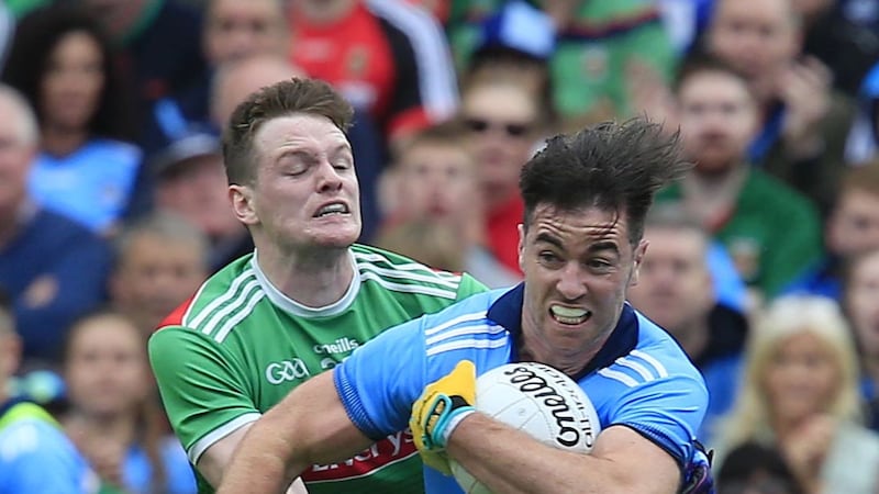 Dublin's Michael Darragh Macauley and Mayo's Matthew Ruane in action during the Electric Ireland GAA Football All-Ireland Senior Championship semi-final between Dublin and Mayo at Croke Park, Dubln on Saturday August 10 2019. Picture by Philip Walsh.&nbsp;