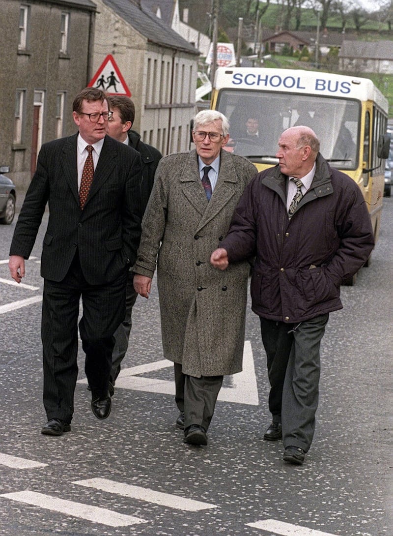 March 4 1998: Tommy Canavan (right), brother of  pub owner with UUP leader David Trimble and SDLP deputy leader Seamus Mallon  in Poyntzpass where they visited the two familys of the men killed. Pic Paul Faith/Pacemaker. 