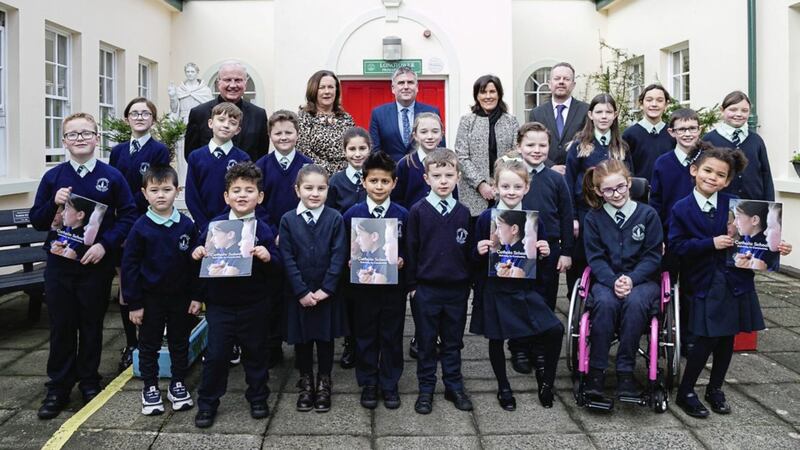 Pictured with pupils from Long Tower Primary School at the launch of Catholic Schools - Delivering for Communities are: Bishop Donal McKeown, chair of CCMS and CSTC; Gerry Campbell, chief executive CCMS; Fintan Murphy, chief executive CSTC; Pat Carville, vice-chair of CCMS; and principal Joyce Logue. Picture by George Pennock. 