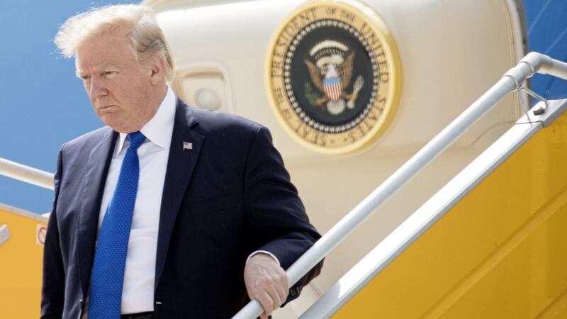 U.S. President Donald Trump arrives in Danang, Vietnam, on his five-country trip through Asia, where he reiterated his &ldquo;America First&rdquo; trade policy at the Asia-Pacific Economic Co-operation Forum 