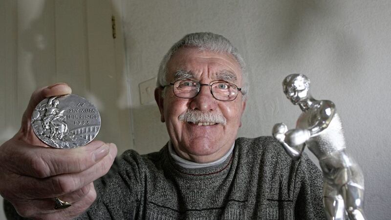 Olympic hero John McNally pictured with the silver medal he won at the 1952 Olympic Games in Helsinki. Picture by Hugh Russell 