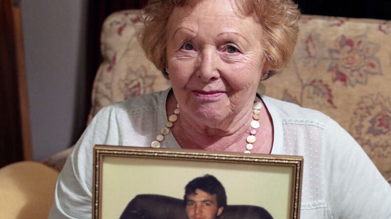 Ivy Lambert (85) holds a photograph of her son Adam Lambert, who was shot dead in Belfast by loyalist paramilitaries the day after the Enniskillen bombing. Picture by Niall Carson/PA Wire 