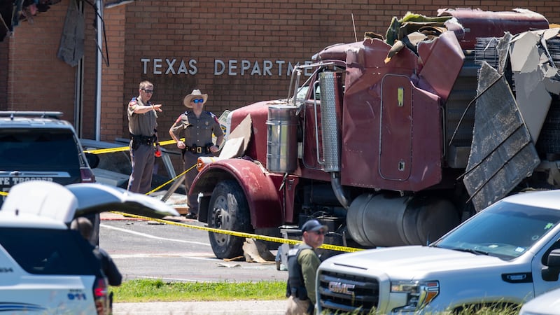 A stolen lorry crashed into a Texas Department of Public Safety office (Meredith Seaver /College Station Eagle via AP)