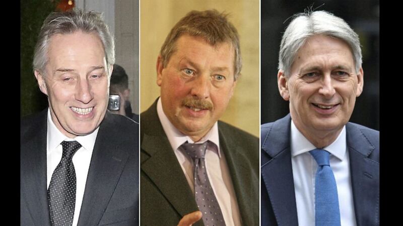 DUP MPs Ian Paisley and Sammy Wilson, and British chancellor Philip Hammond 