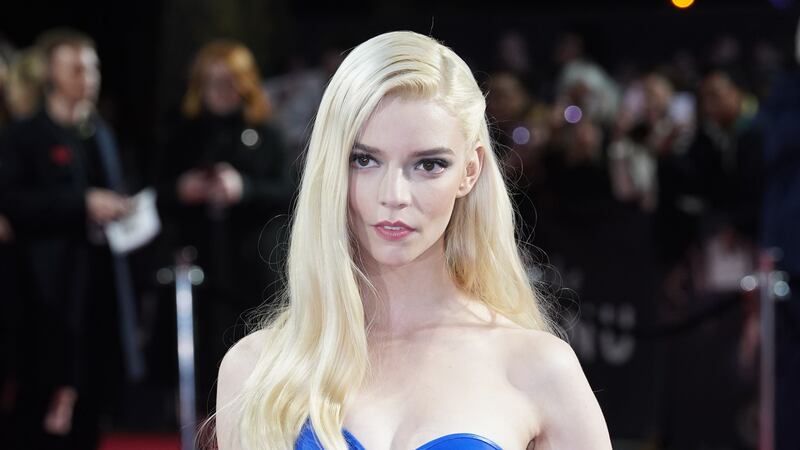 The Hollywood actress shone at the London event in an electric blue, corseted outfit, with an asymmetrical hem. 