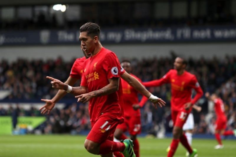 Liverpool's Roberto Firmino celebrates scoring his side's first goal of the game