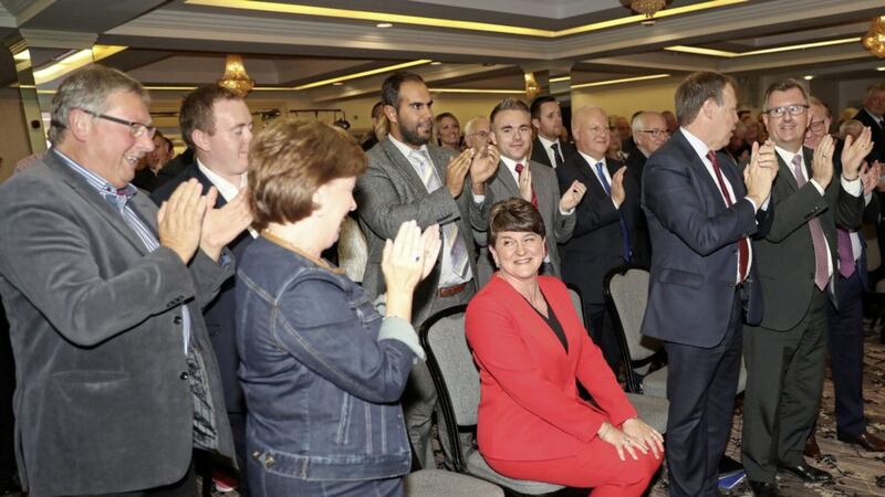 DUP leader Arlene Foster celebrates with her supporters after speaking at the Crowne Plaza Hotel in south Belfast last Thursday, on transfer deadline day. Picture by Declan Roughan. 