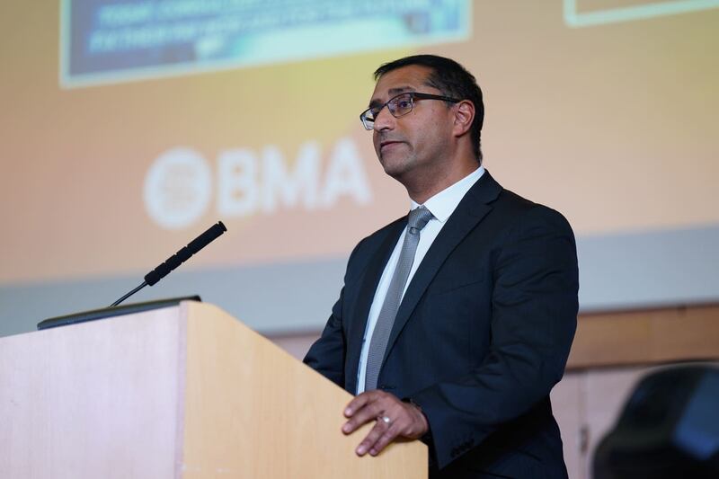 Dr Vishal Sharma speaks during a rally of consultant members of the British Medical Association at the BMA headquarters in London