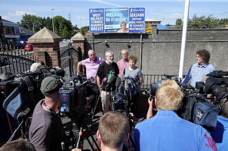 Gerry Adams speaks to the media following an attack on his and Bobby Storey's homes in west Belfast. Picture by Mal McCann