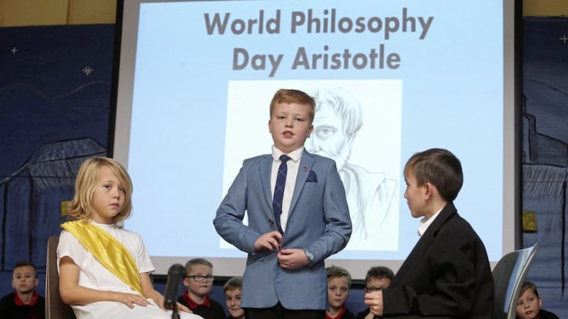 Aidan Mailey, Ben Osborne, Dylan Barnes take part in World Philosophy Day at Holy Cross Boys School in Ardoyne. Picture by Mal McCann 