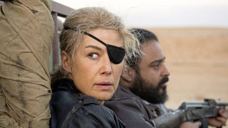 Rosamund Pike as Marie Colvin in A Private War 